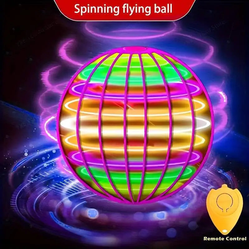 A spinning, multi-colored LED flying ball is shown floating in a dark environment with a remote control nearby.