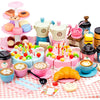 A pretend play tea party set featuring various cups, cakes, and food items for children.