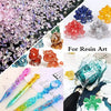 A collection of crushed pink and purple crystals, colorful glass shards, and various shaped glass pieces for resin art and je