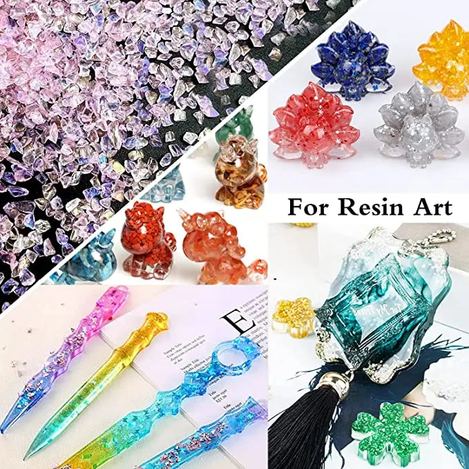 A collection of crushed pink and purple crystals, colorful glass shards, and various shaped glass pieces for resin art and je