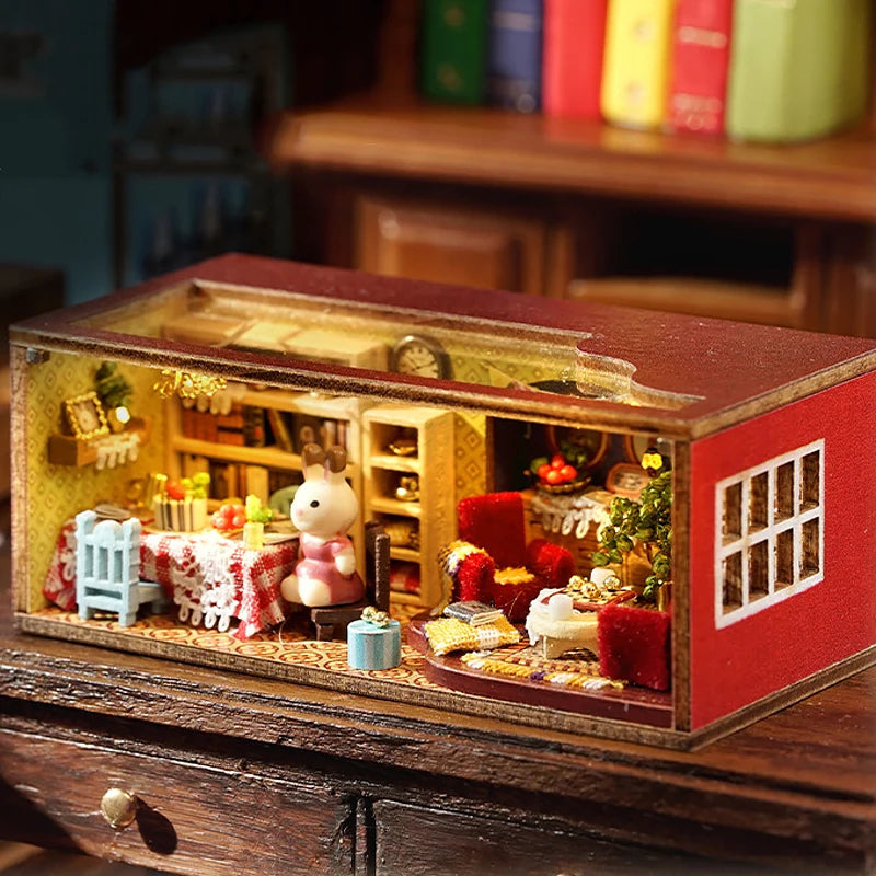 A wooden miniature dollhouse kit featuring a detailed interior display of food and furniture.