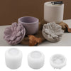 A set of floral silicone molds in purple and gray for decorative storage jars and candle cups.
