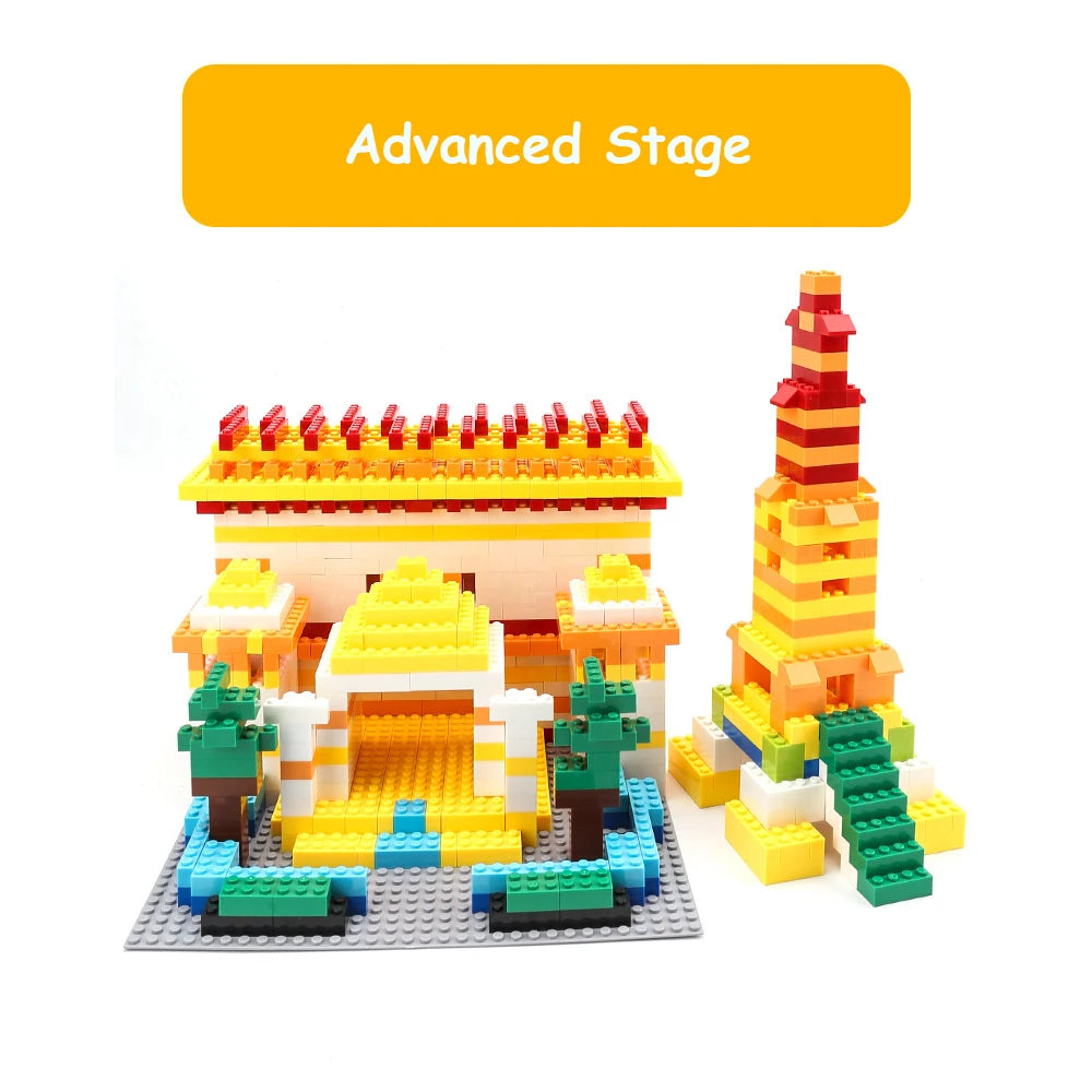 An Advanced Stage built from yellow and orange LEGO bricks featuring a fortress and a tall tower.