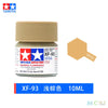 A bottle of Tamiya color acrylic paint labeled XF-93, a matte brown shade, with a light tan cap.