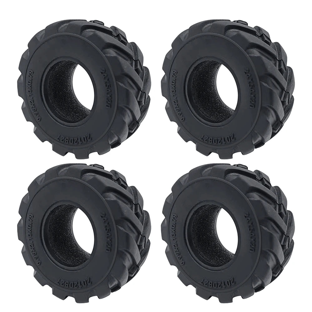 Quatre roues en caoutchouc souple noires pour voitures RC crawler, vues sous différents angles