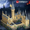A detailed medieval castle built from tan blocks set against a dark, stormy background with a large moon visible.
