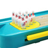 A mini frog bowling game set with ten white and red bowling pins arranged in a yellow tray.