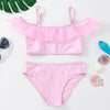 Pink girls two-piece swimsuit set with ruffled top and brief bottom