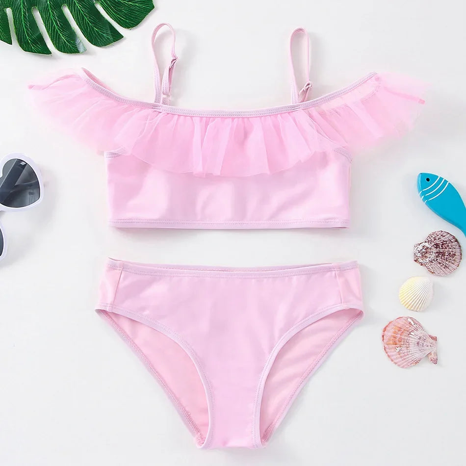 Pink girls two-piece swimsuit set with ruffled top and brief bottom