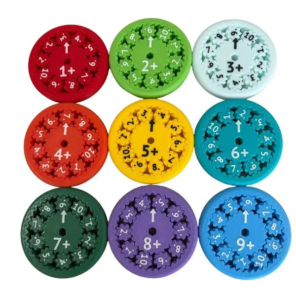 A set of nine colorful math fidget spinners showing multiplication practice for kids.