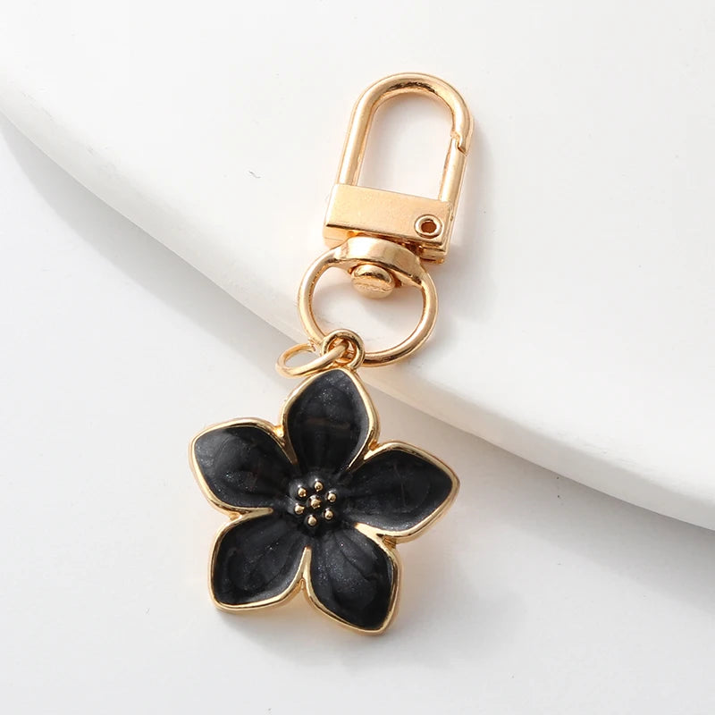 Floral Enamel Keychains with Vibrant Plant Designs