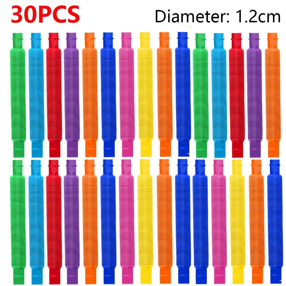 A collection of 30 colorful plastic telescopic tubes or pop tubes in various colors like red, blue, green, and orange.