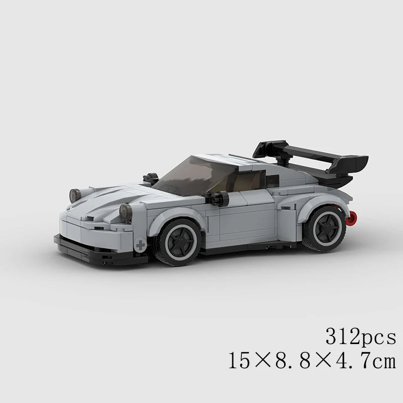 A gray and white classic rally car building block set with a black roof and racing wheels.