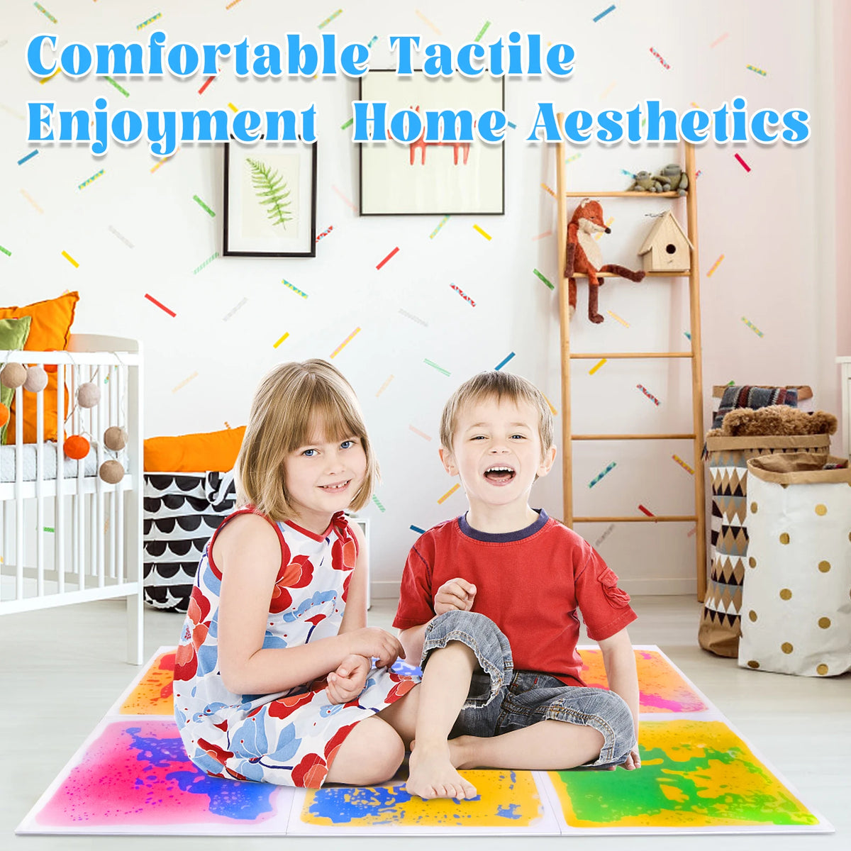A boy and a girl sit on a colorful liquid sensory play mat indoors.
