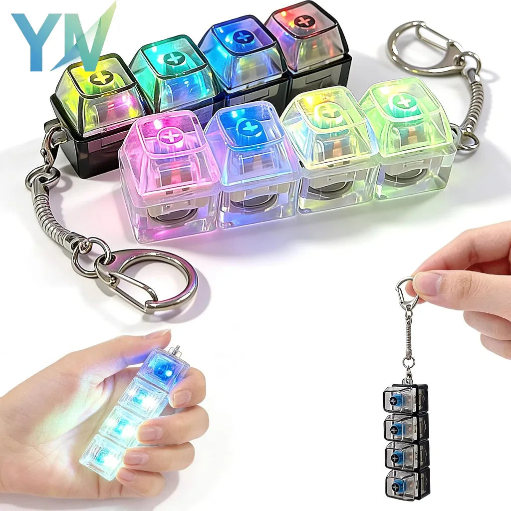 A collection of colorful LED keyboard keycap fidget flashlights are displayed, with one being attached to a keychain.