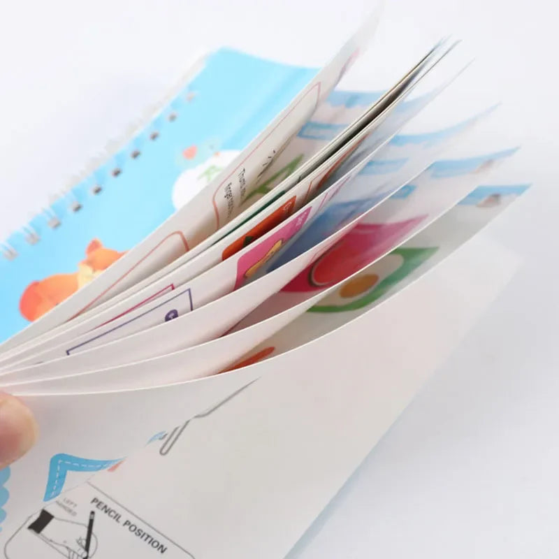 A stack of reusable magic tracing workbook pages showing pencil position and tracing lines.