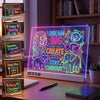 A glowing neon sign featuring a lion, a bear, and an elephant surrounded by text like Dream Big Create Stay Curious