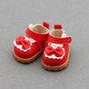 A pair of red casual sneakers designed for 17cm Labubu dolls.