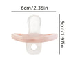 A soft pink silicone baby pacifier with a rounded top and a central hole.