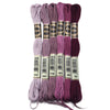 A set of six skeins of vibrant embroidery thread in various shades of purple and magenta for cross stitch and DIY crafts