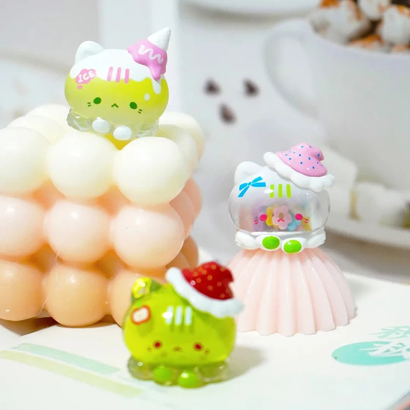 A set of cute mini bean blind box figurines featuring an ice cream cat tower and a strawberry mousse tower.
