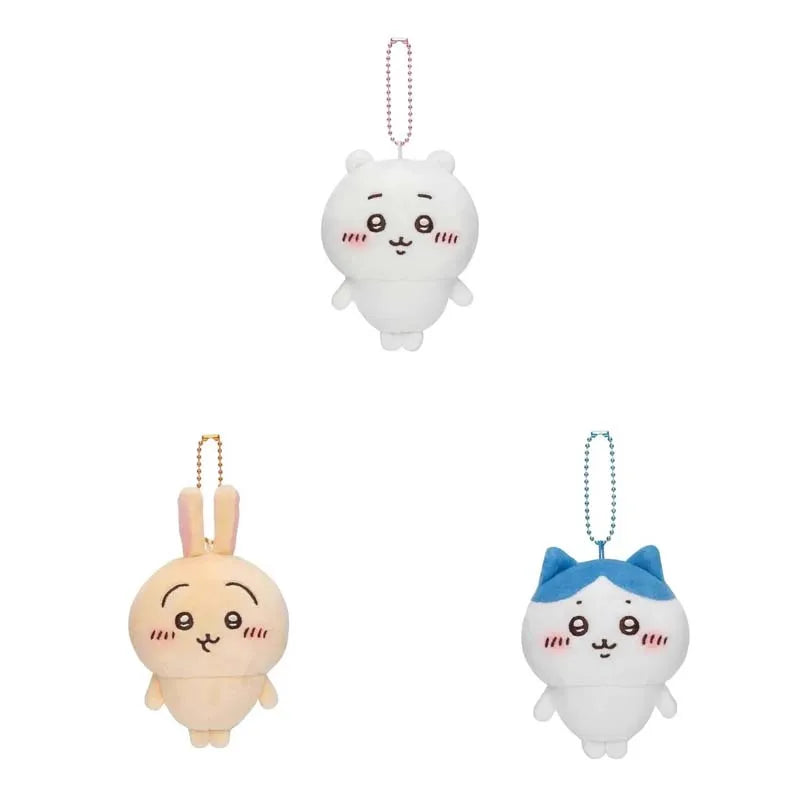 A white Chiikawa Usagi plush keychain charm with pink accents.