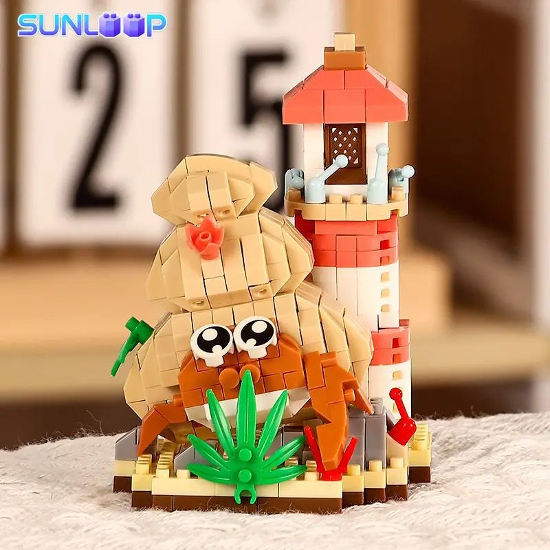 A set of building blocks featuring a shark, crab, and clownfish ocean animals.