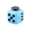 A light blue fidget cube with a black rotating joystick and magnetic buttons.