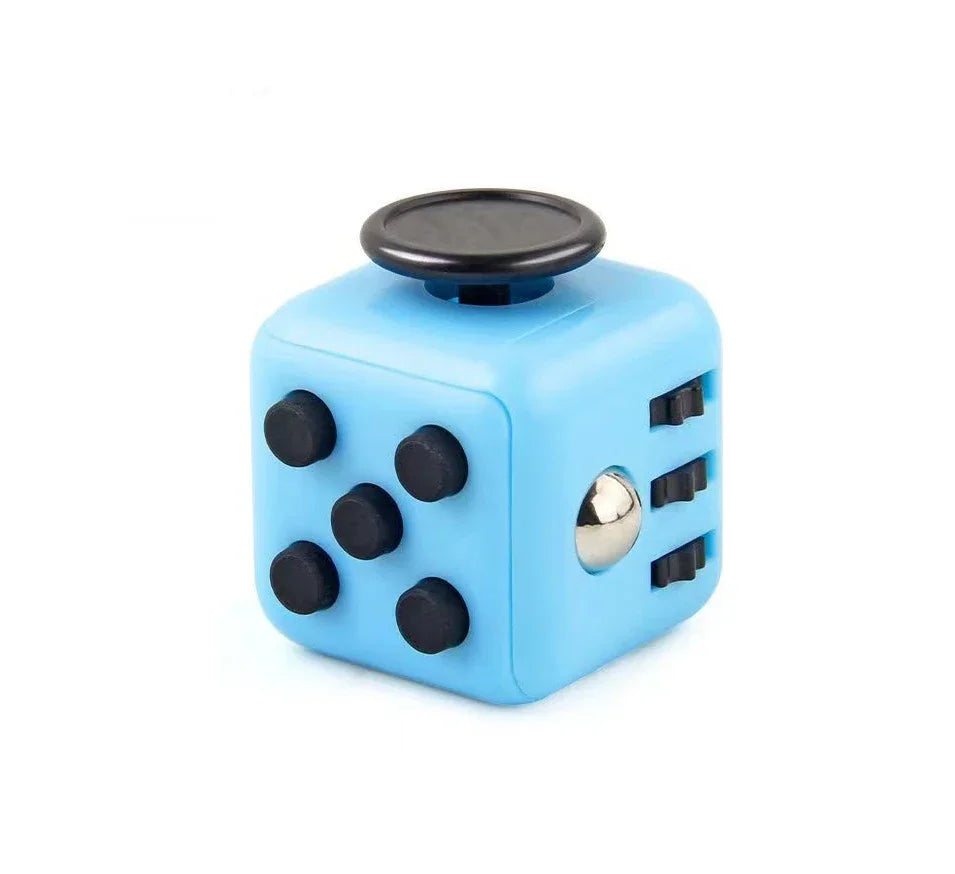 A light blue fidget cube with a black rotating joystick and magnetic buttons.