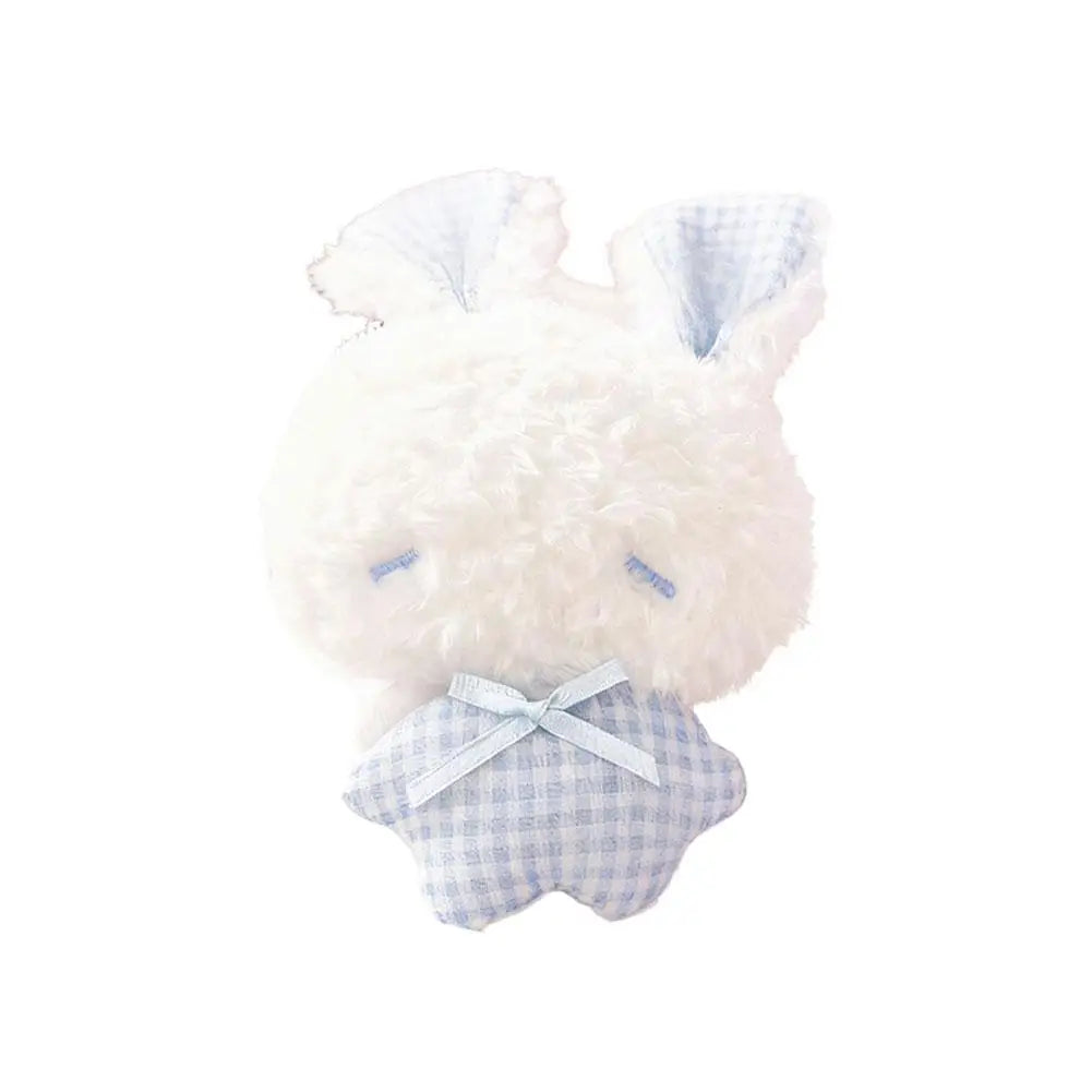 A white plush bunny with light blue accents and a matching checkered bow