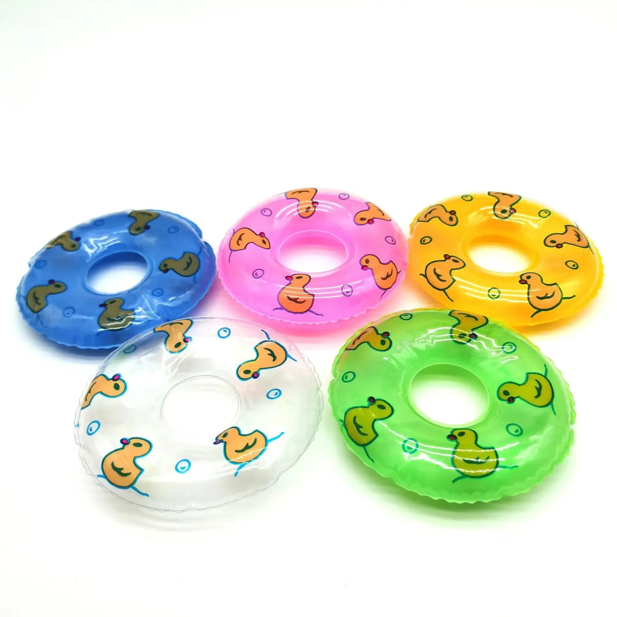A set of five colorful mini rubber duck accessories including sunglasses and hats