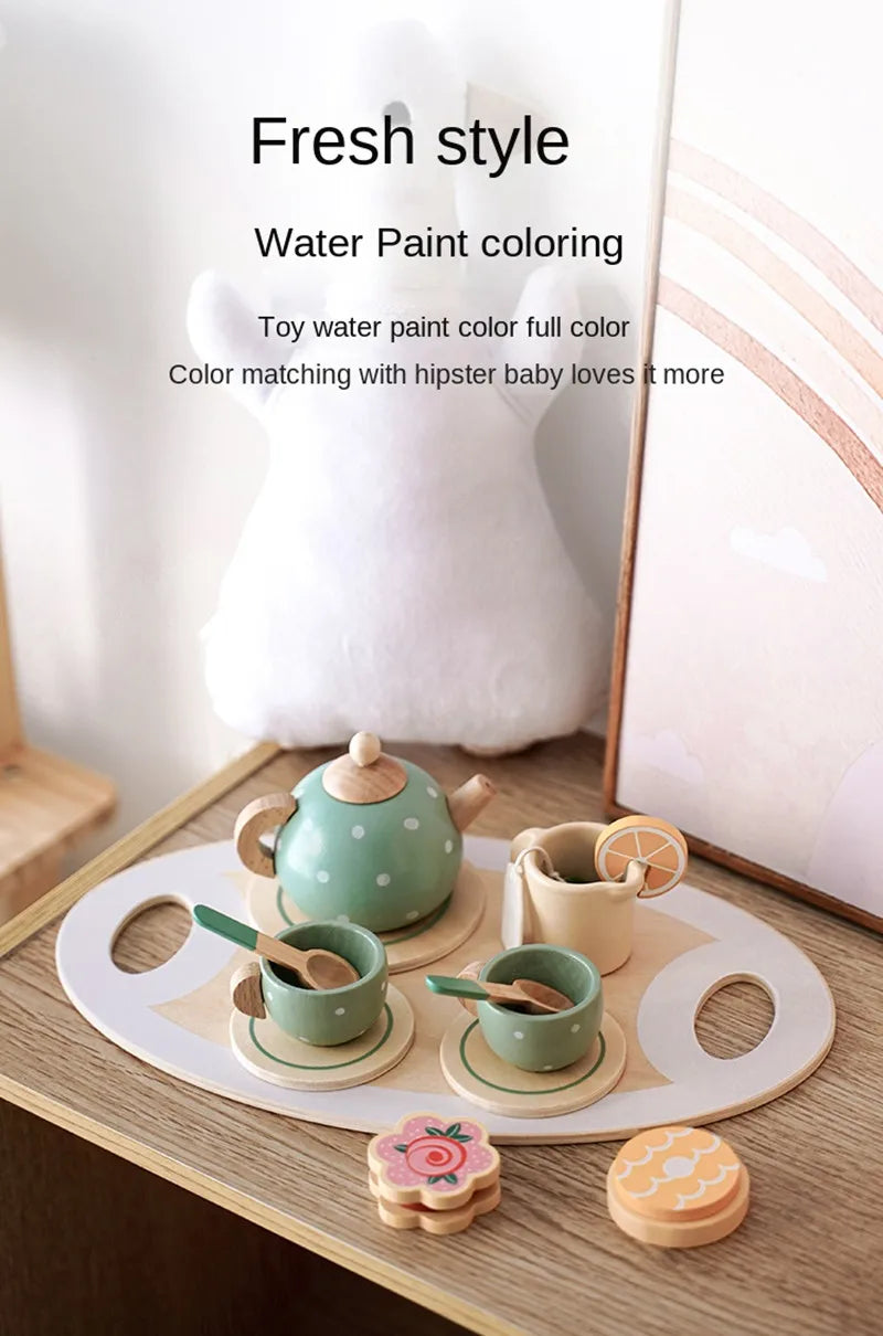 A set of wooden pretend play tea party cups and teapot for water paint coloring.