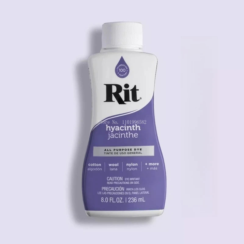 A white bottle of Rit All Purpose Dye liquid with a white cap and purple liquid inside.