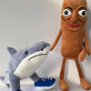 A plush toy of a shark and a humanoid figure with a brown face and body.