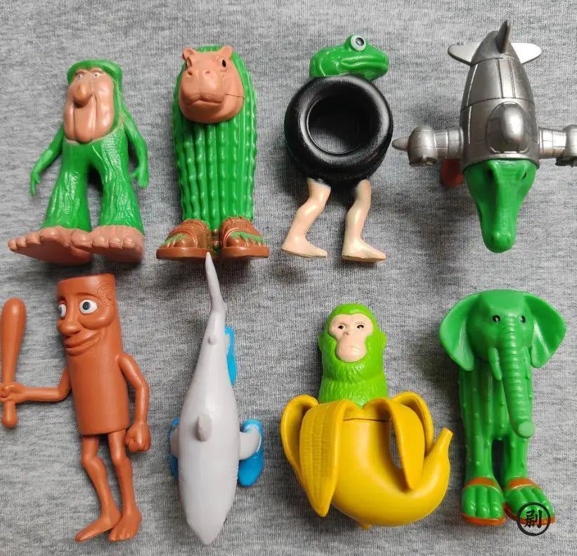 A collection of eight quirky wooden stick doll figures in various colors and styles.