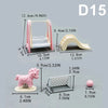 A set of 1:12 scale dollhouse furniture accessories including a pink horse, a white shelf, and various small items.