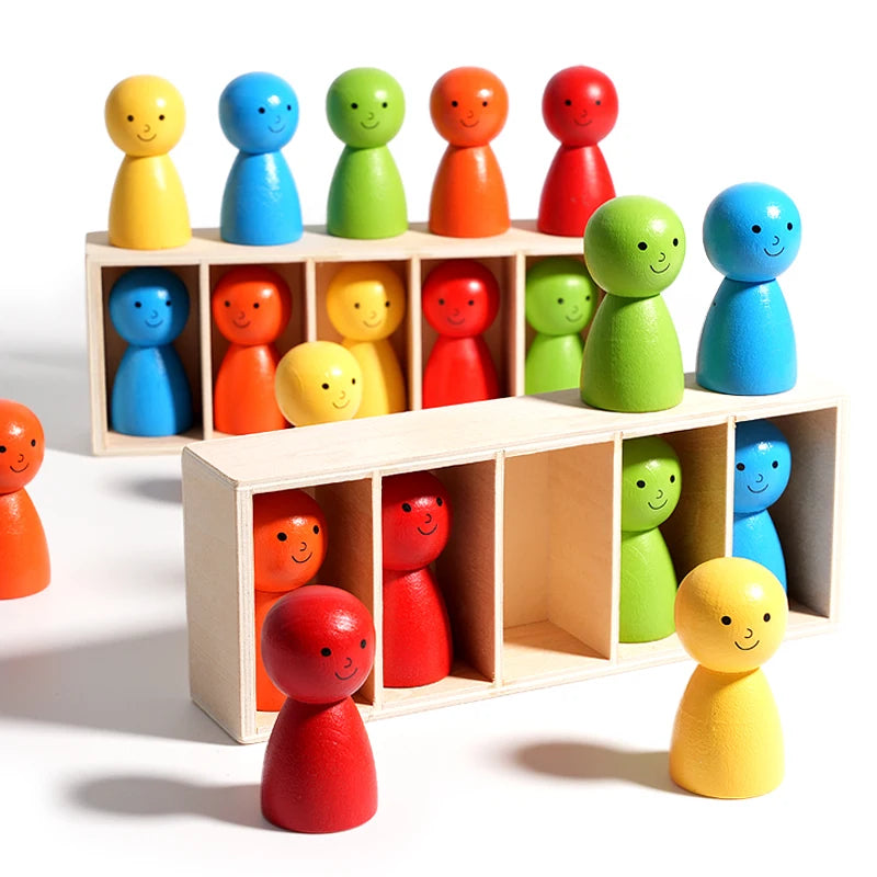 A collection of colorful wooden figures in various colors arranged on a light-colored wooden shelf.