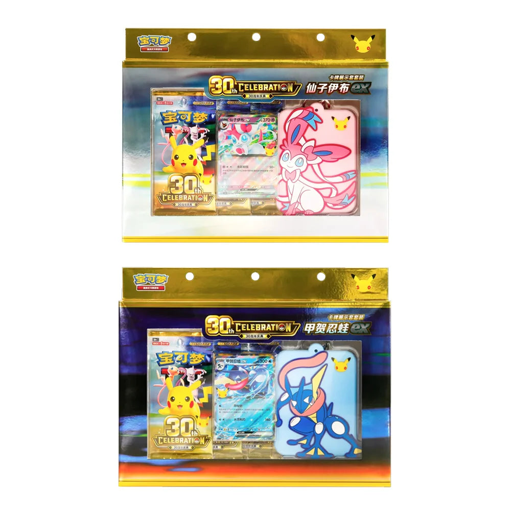 A set of 30th Anniversary Pokemon display cards featuring Greninja and Sylveon characters in a yellow and pink packaging.