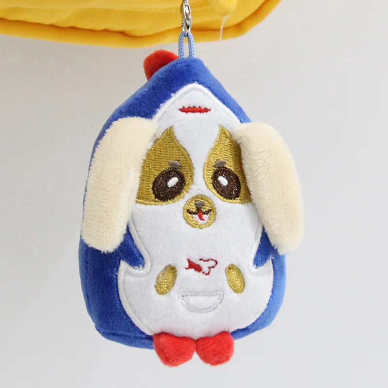 A plush pendant doll of a dog character with blue and white fur and gold accents.