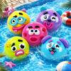 Colorful squishy toys shaped like various animal faces floating in water