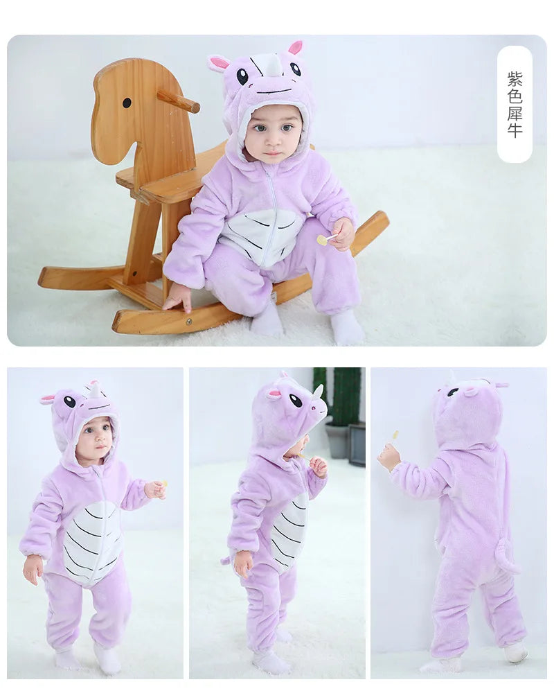 A baby wearing a purple animal hooded romper sitting on a wooden toy horse.