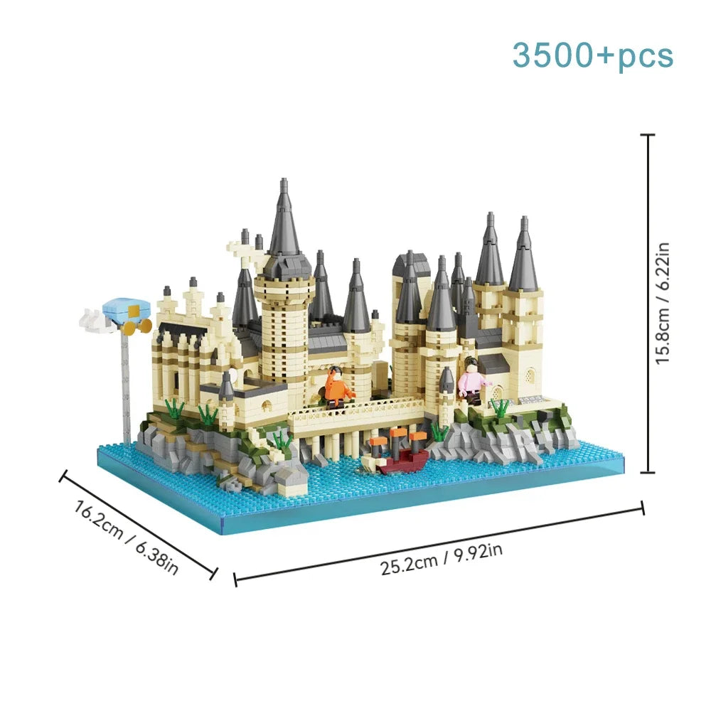 A detailed medieval castle building block set featuring stone towers and battlements on a blue base.