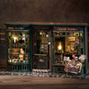 A display of a miniature magical wand shop featuring antique glass cabinets and wooden furniture.