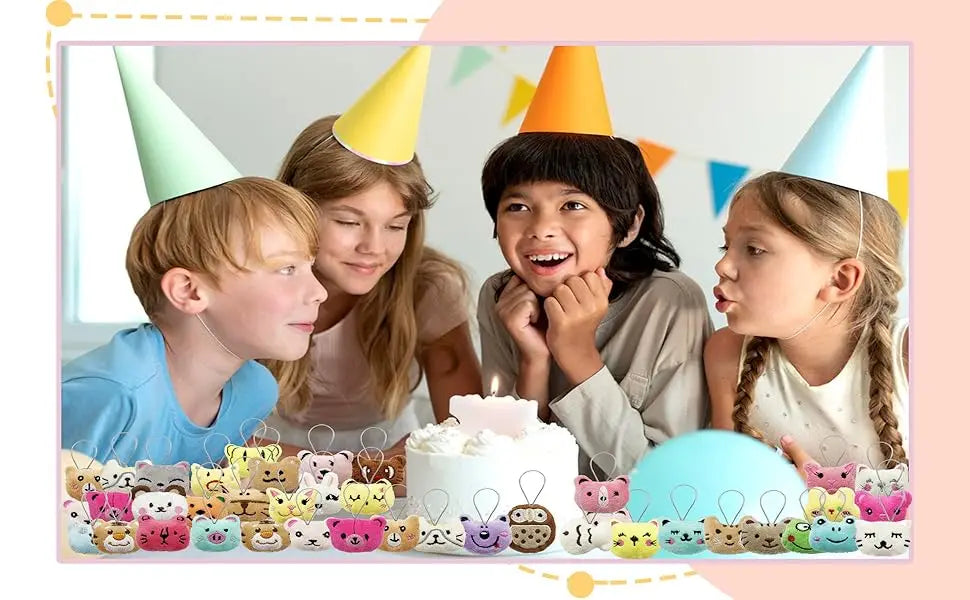 A group of children are shown with a white cake decorated with small animal plush toys and keychain loops.