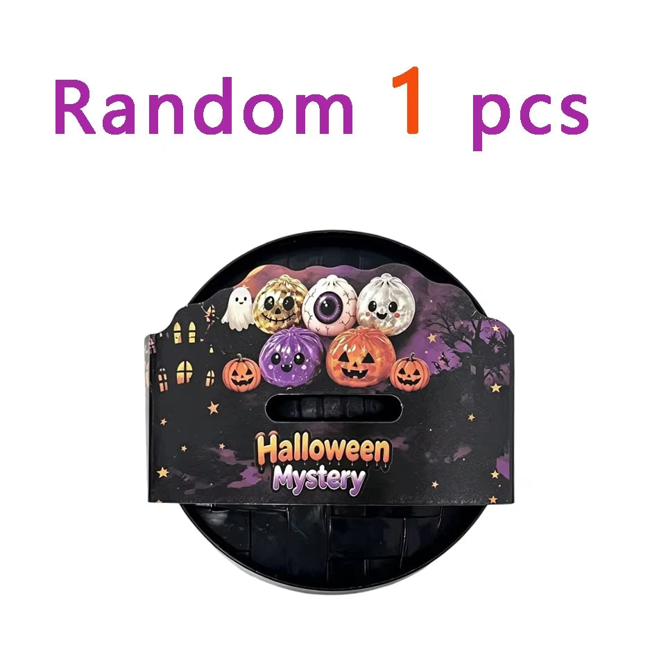 A set of Halloween squishy fidget toys including glitter pumpkin, eyeball, and skull stress relief balls in a black box.