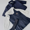 Navy knit sweater and pleated pants set for a toddler