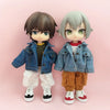 Two 1/12 scale dolls wearing denim jackets and casual clothing