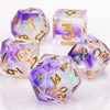 A set of handmade resin polyhedral dice in purple and clear glass, including a d10, d6, d8, d12, d20, and d100.