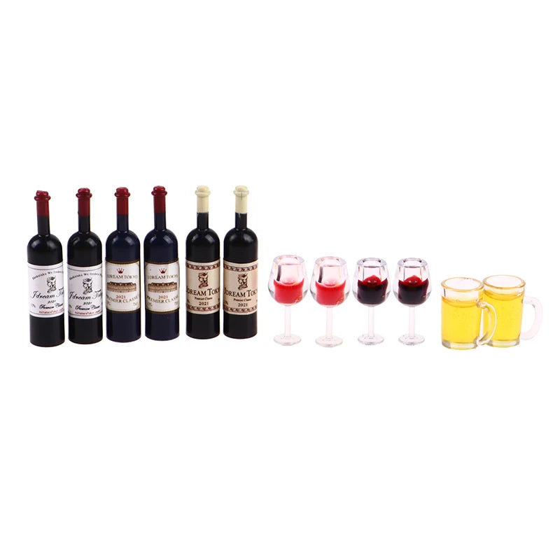 A set of five miniature resin wine bottles and four small juice glasses for a dollhouse display.