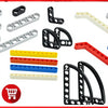 A collection of various Technic liftarm beams and building blocks in black, gray, white, and blue colors.
